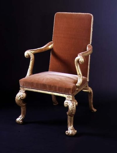 Gilt armchair with velvet upholstery by English School